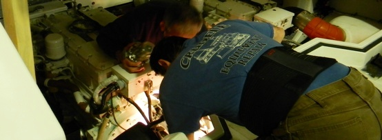 Guy Crudele working on engine 2 Guy Crudele working on engine 2